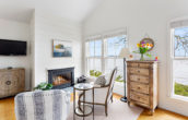 The fireplace in the Fitz Henry Lane Cottage at our oceanfront bed and breakfast in Maine