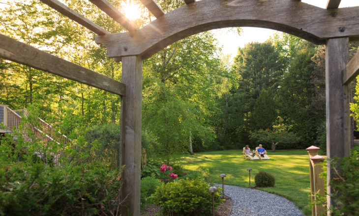 Couple enjoying a glass of wine in the gardens