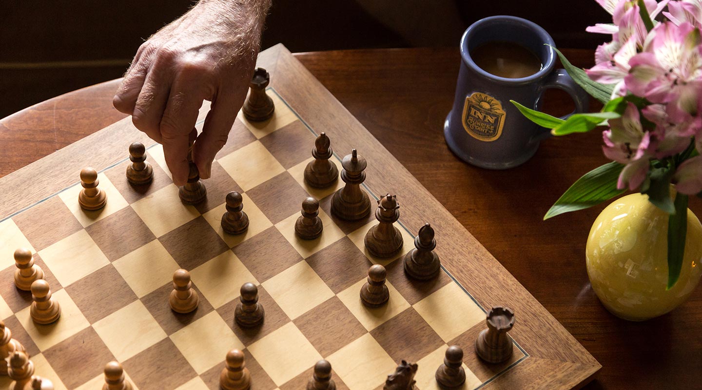 Relaxing day playing chess at our Camden, Maine boutique hotel