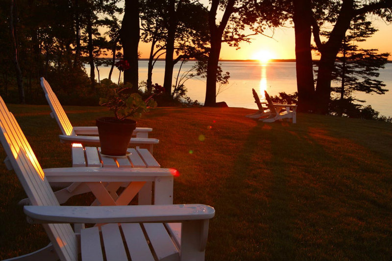 Beautiful sunset from the Adirondack chairs at the Inn at Sunrise Point