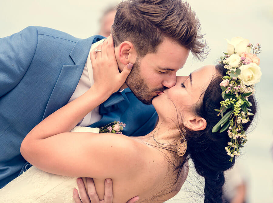 bride and groom kissing