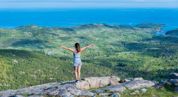 Woman Enjoying an Ocean View on the Best Day Trip in Maine